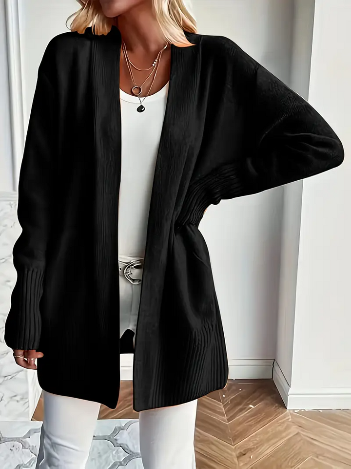 Women's knitted sweater with a round neckline and relaxed fit