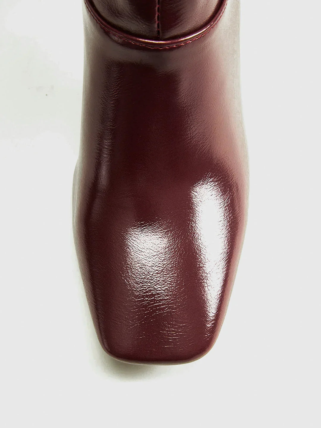 Women's tall brown boots with modern square heels