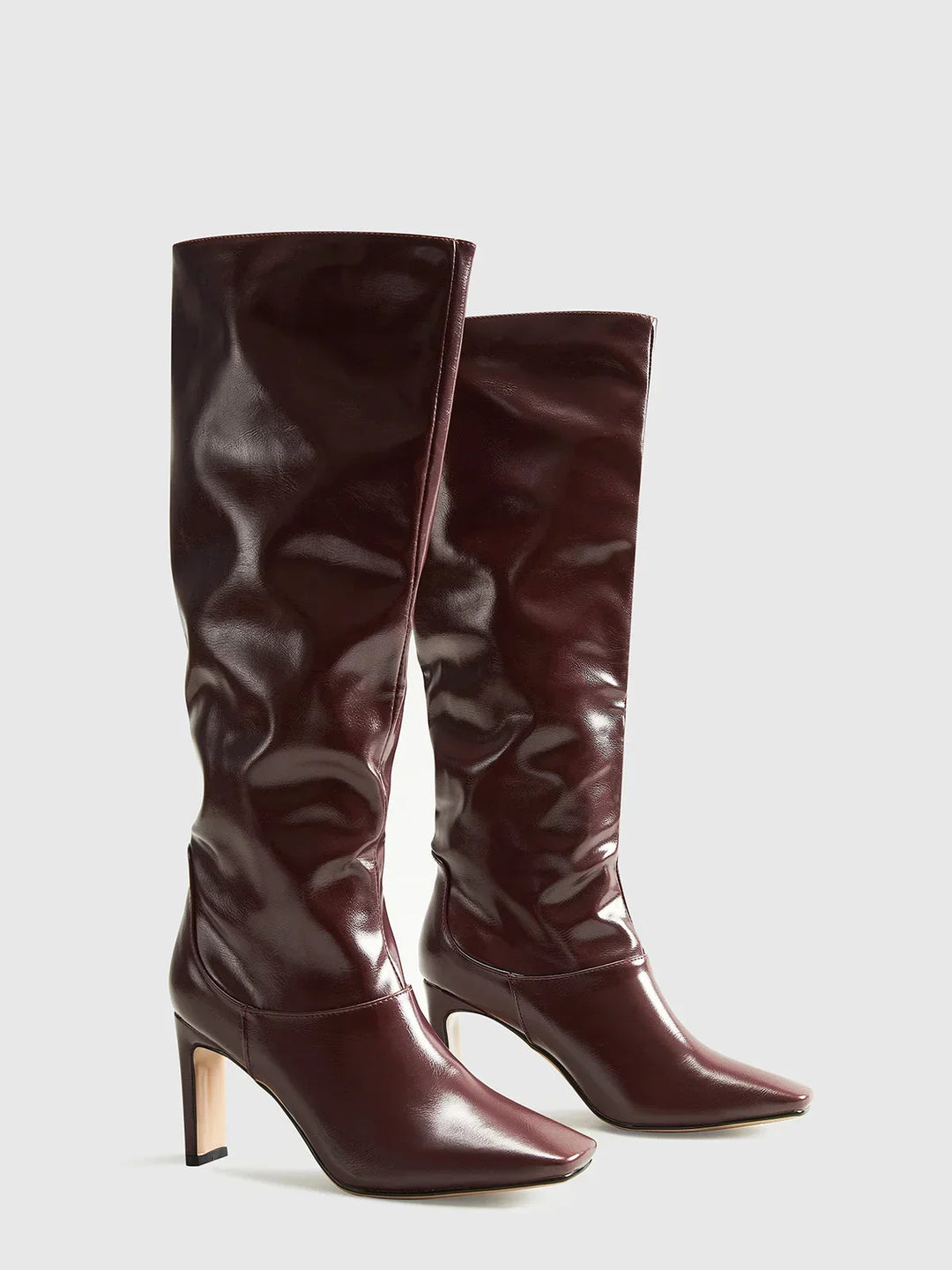 Women's tall brown boots with modern square heels