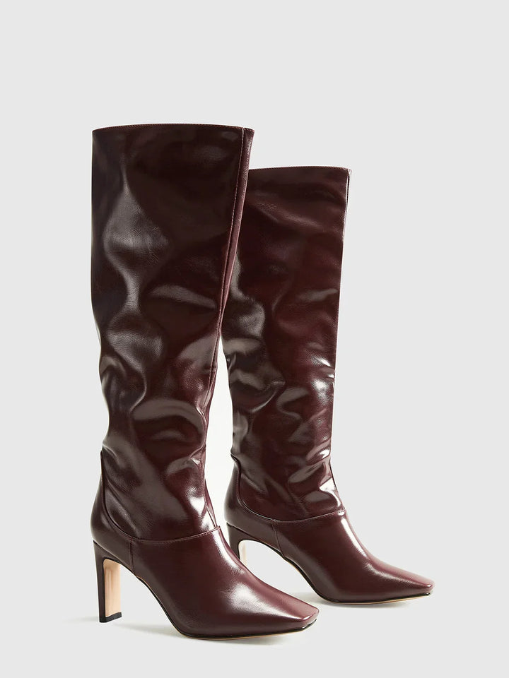 Women's tall brown boots with modern square heels