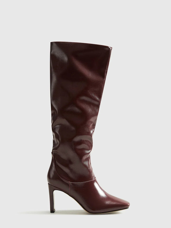 Women's tall brown boots with modern square heels