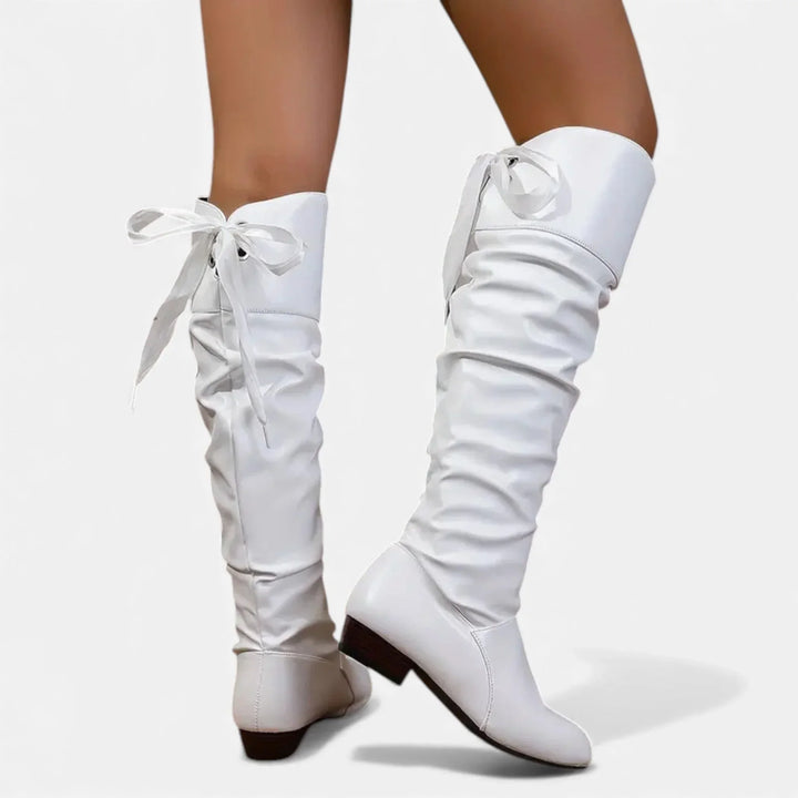 Women's mid-calf boots with decorative bow and low heel