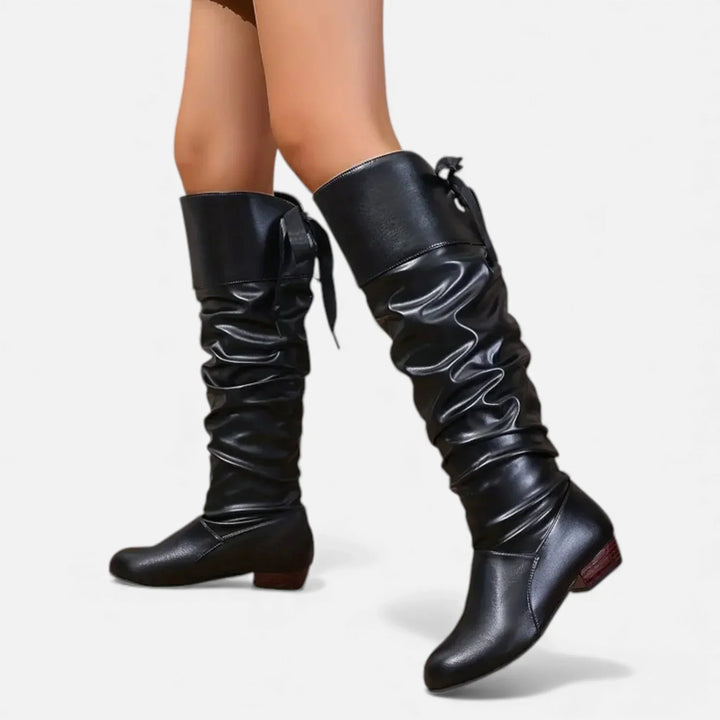 Women's mid-calf boots with decorative bow and low heel