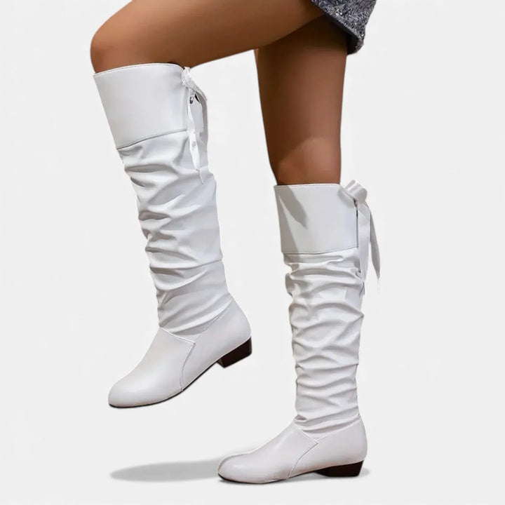 Women's mid-calf boots with decorative bow and low heel