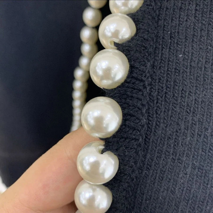 Women's cardigan with elegant pearl detail