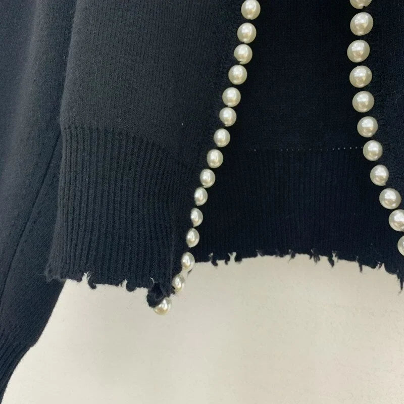 Women's cardigan with elegant pearl detail