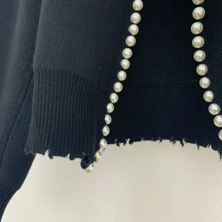 Women's cardigan with elegant pearl detail