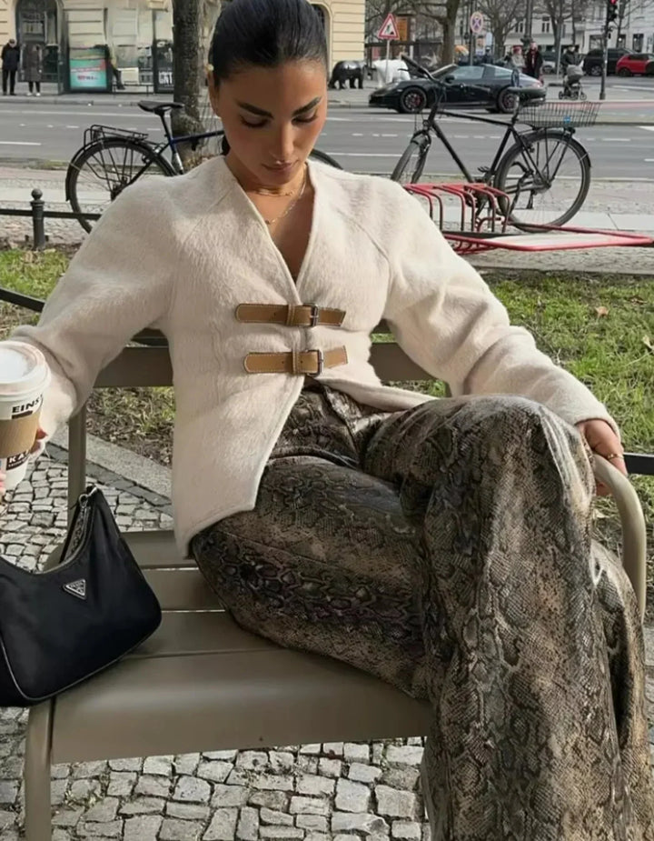 Modern women's cardigan with beige straps