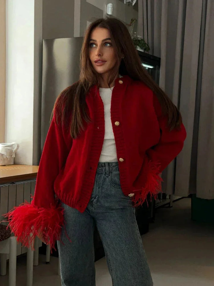 Red women's cardigan with feather sleeves and buttons