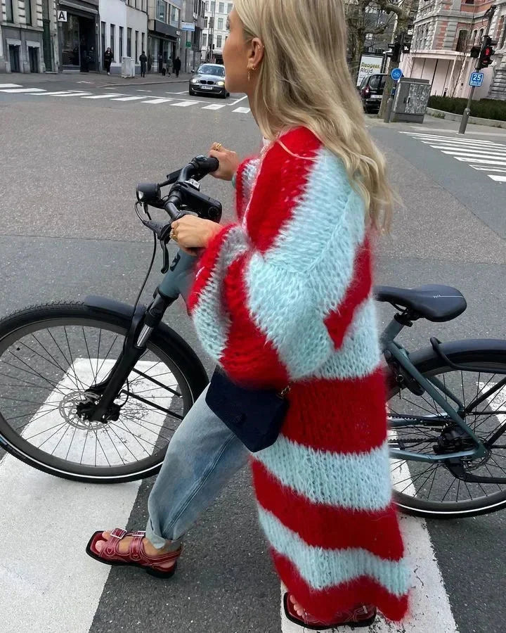 Long striped women's cardigan with contemporary design.