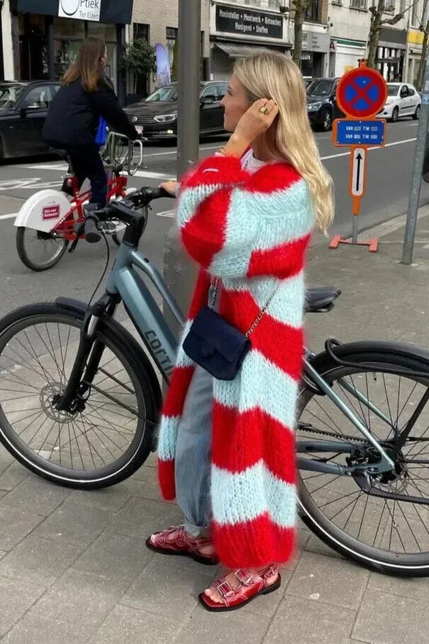 Long striped women's cardigan with contemporary design.