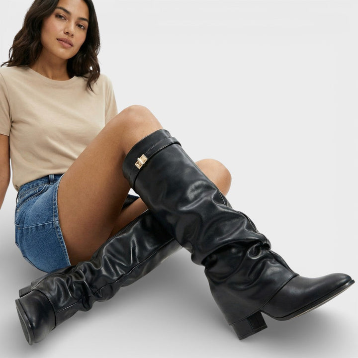 Women's high boots with pointed toe, ruched, low heel, and buckle