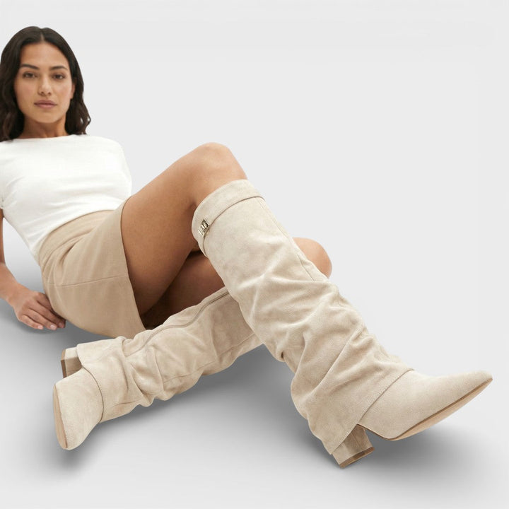 Women's high boots with pointed toe, ruched, low heel, and buckle