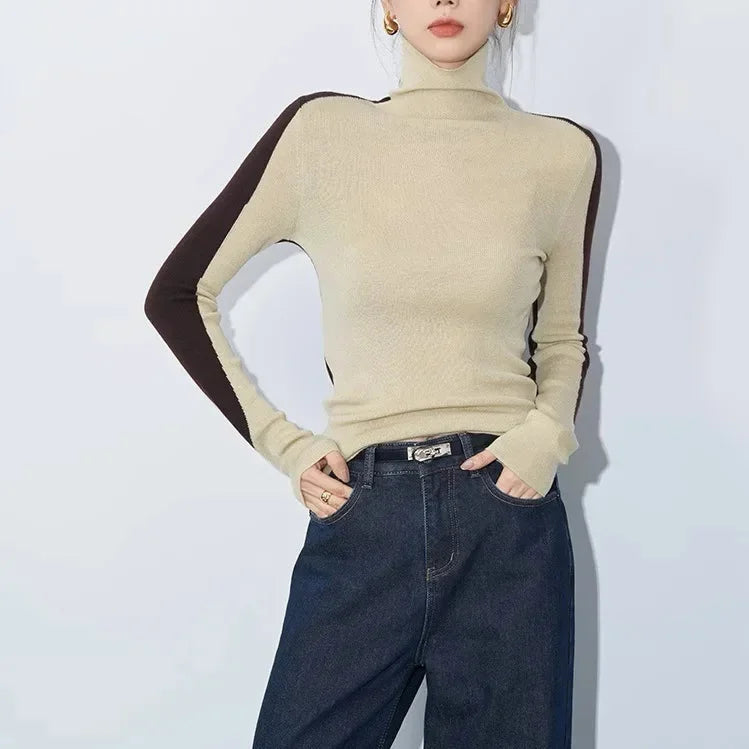 Women's top with stand-up collar and contrasting sleeves