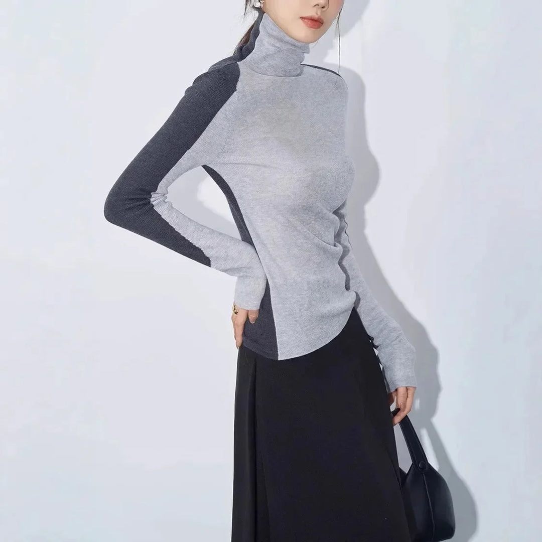 Women's top with stand-up collar and contrasting sleeves