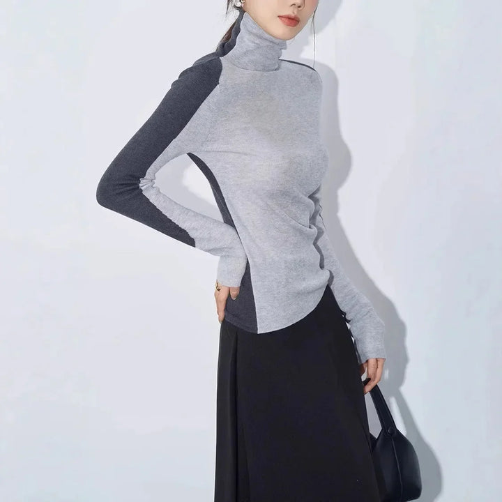 Women's top with stand-up collar and contrasting sleeves