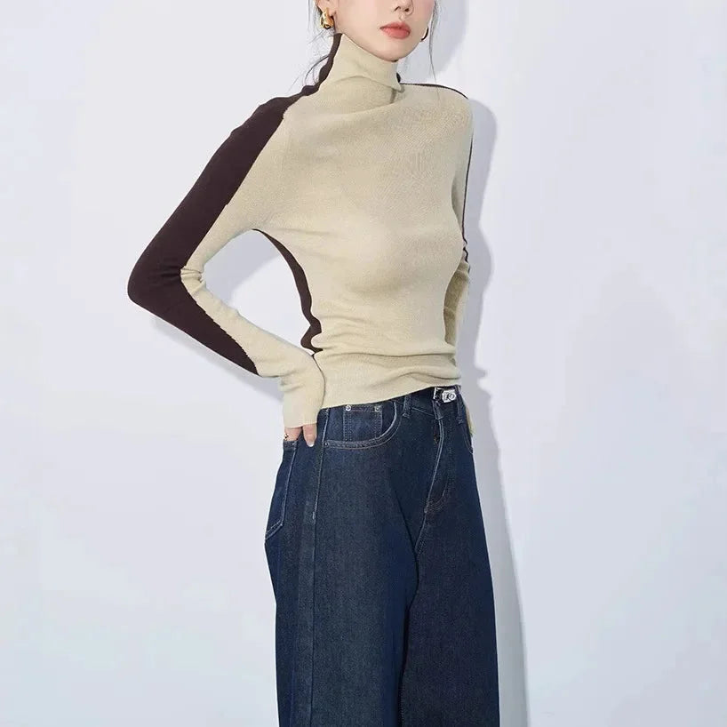 Women's top with stand-up collar and contrasting sleeves