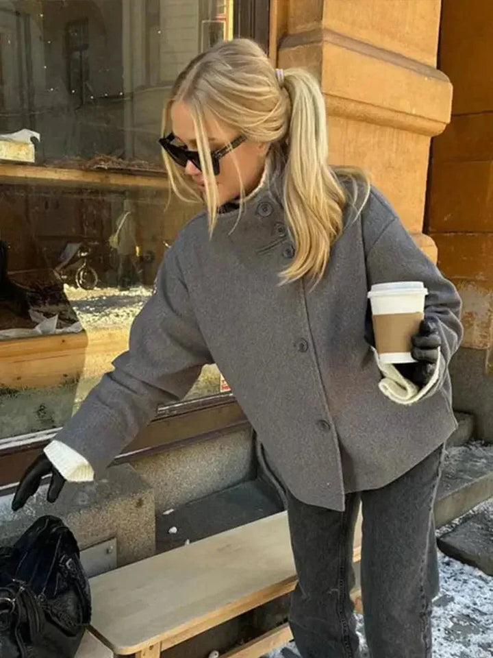 Short Women's Coat with Buttons and a High Collar