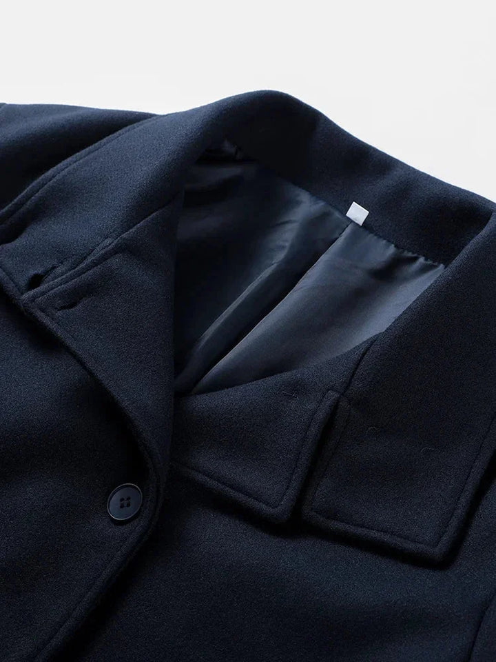 Short Women's Coat with Buttons and a High Collar