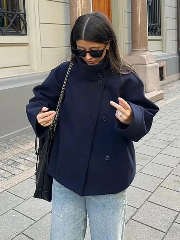 Short Women's Coat with Buttons and a High Collar