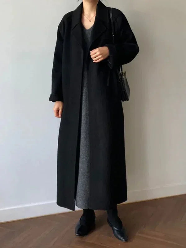 Long women's coat with belt and chic collar