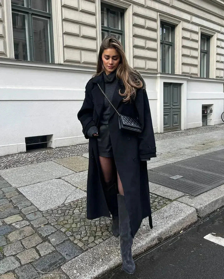 Long black coat for women with belt and wide lapels