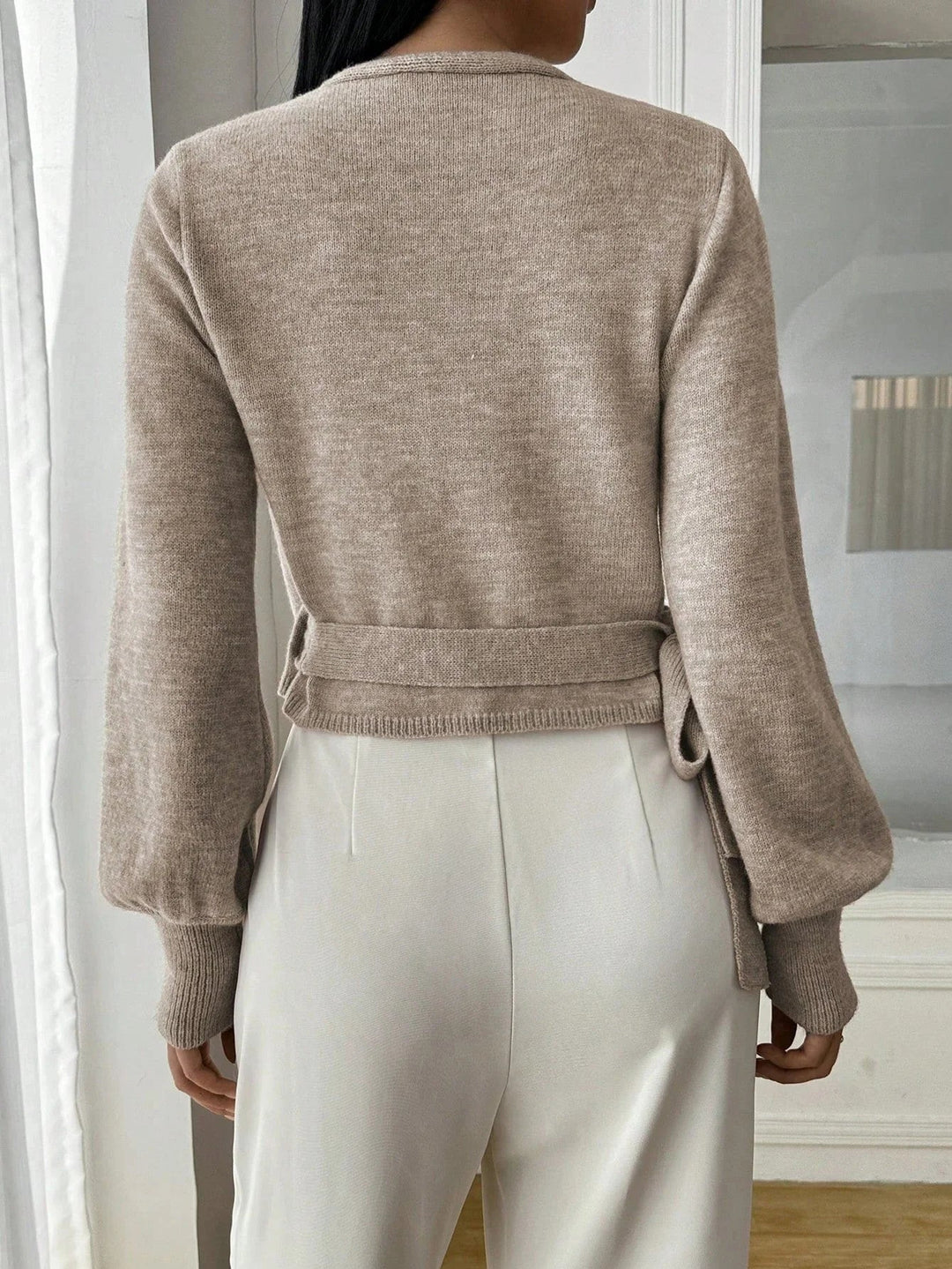 Women's wrap sweater with tie belt
