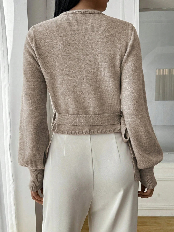 Women's wrap sweater with tie belt