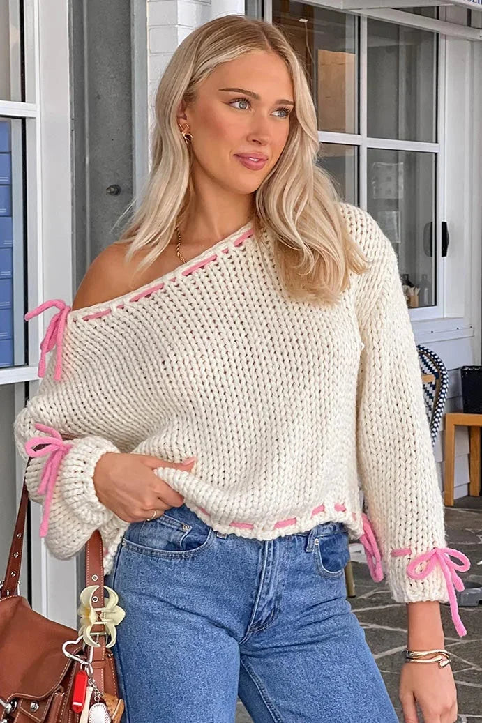 Women's asymmetrical sweater with trendy ties