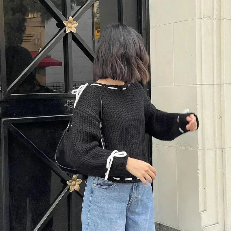 Women's asymmetrical sweater with trendy ties