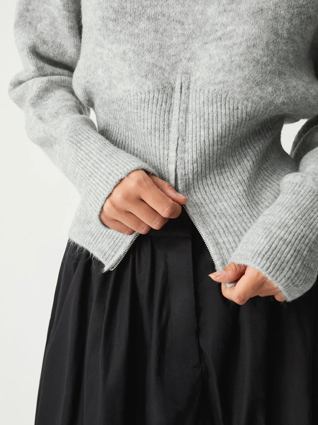 Grey women's sweater with half-zip and long sleeves