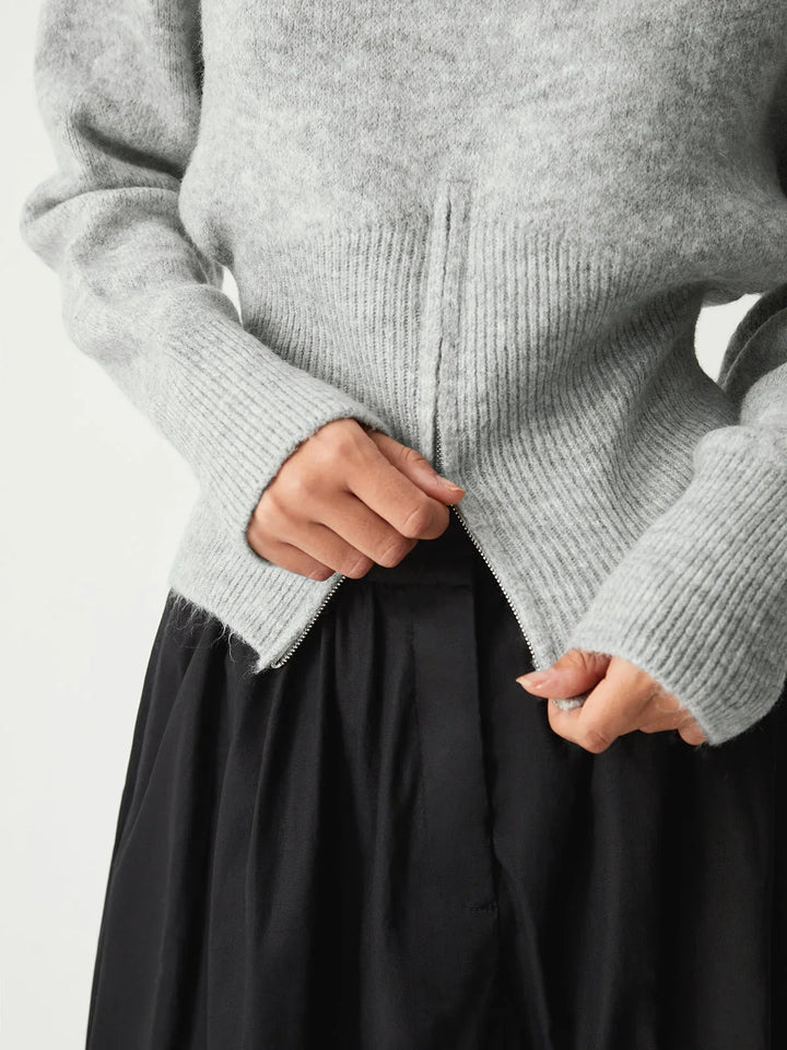Grey women's sweater with half-zip and long sleeves