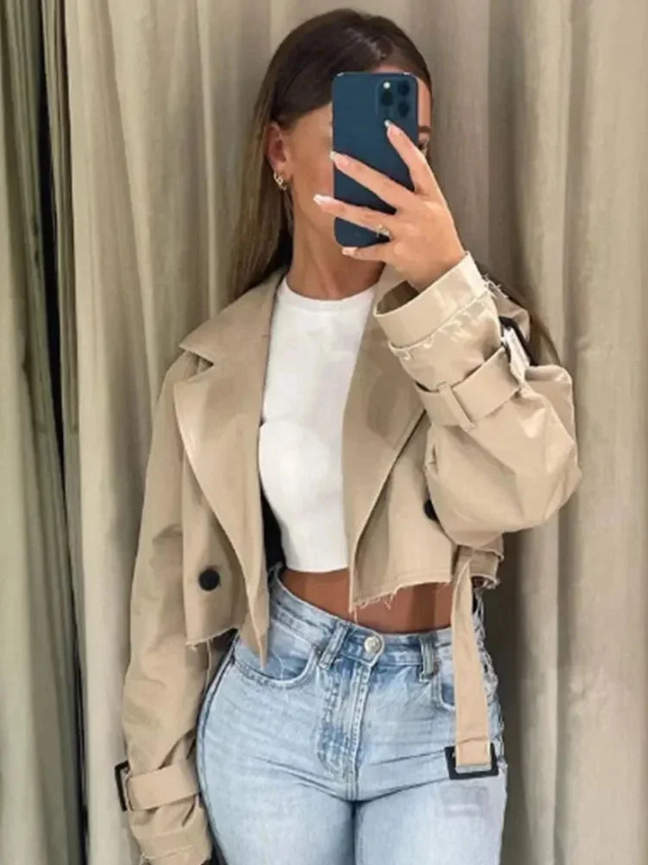 Short beige trench coat for women with elegant long sleeves