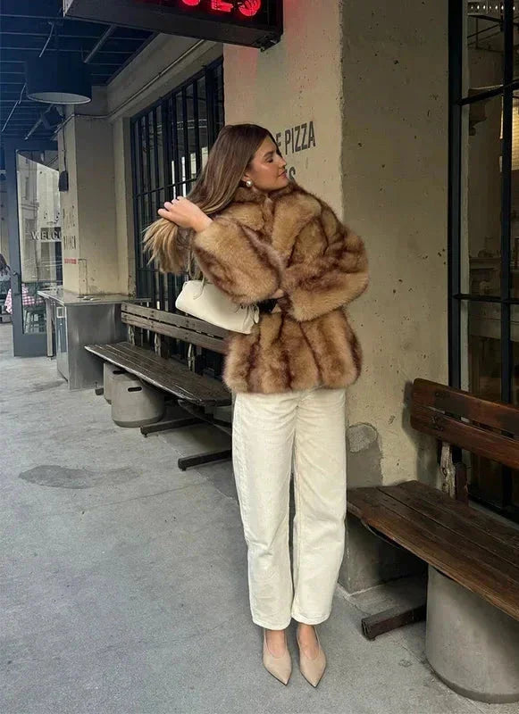 Elegant brown women's blazer with striking closure
