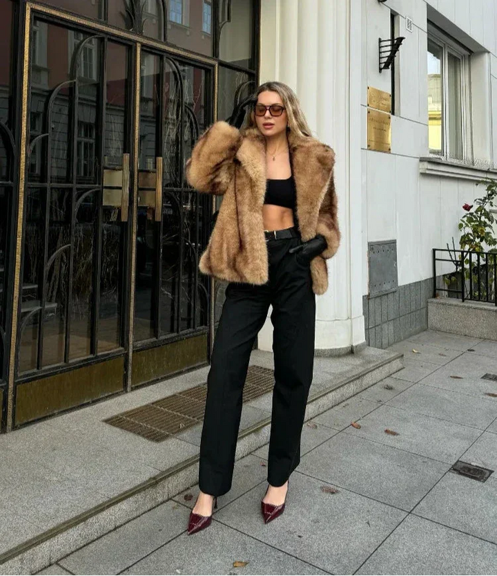 Elegant brown women's blazer with striking closure